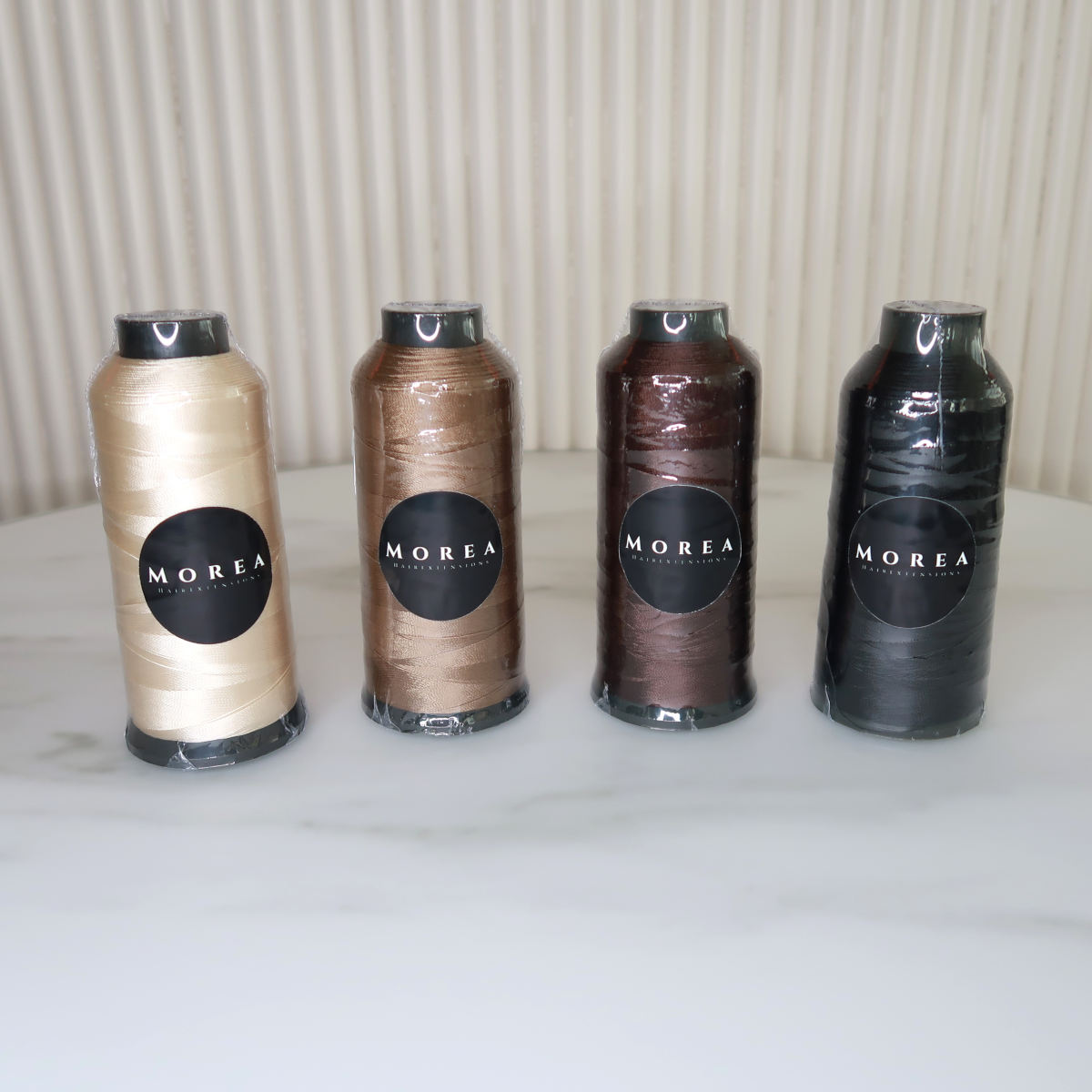4 Tressenfäden für Genius Wefts, 2'100 Meter pro Rolle, in 4 Farben