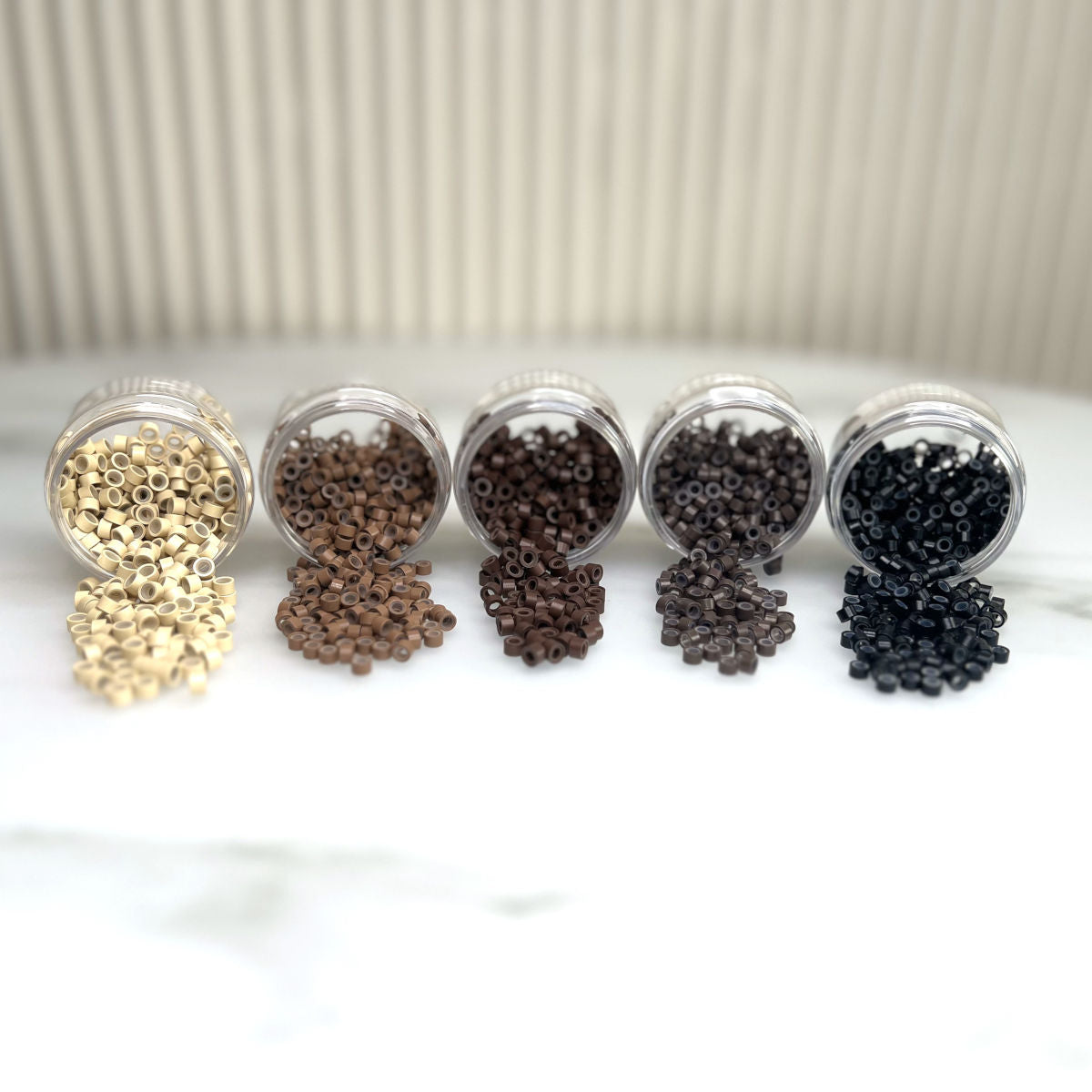 Mikroringe aus Silikon (innen) in 5 Farben: Schwarz, Dunkelbraun, Braun, Hellbraun, Blond